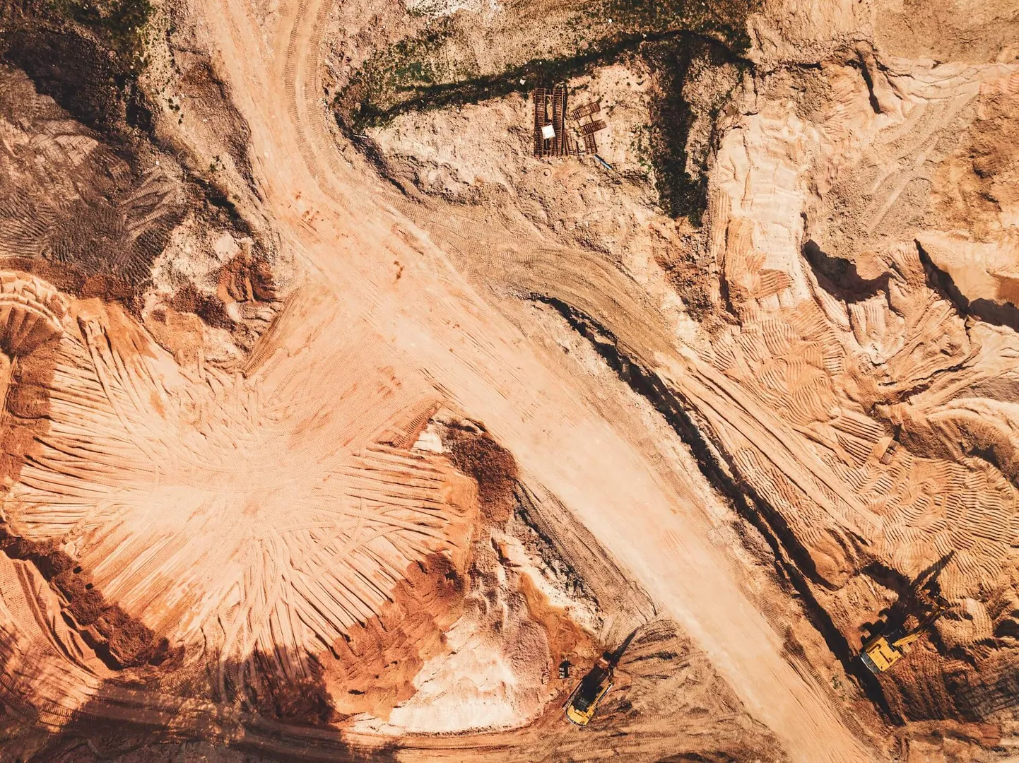 Aerial view of construction site with excavators